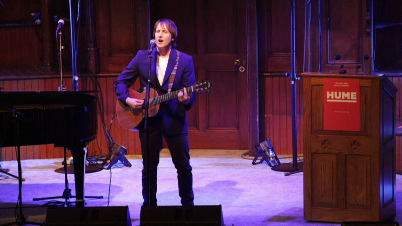 Tim performs “Shining Light”