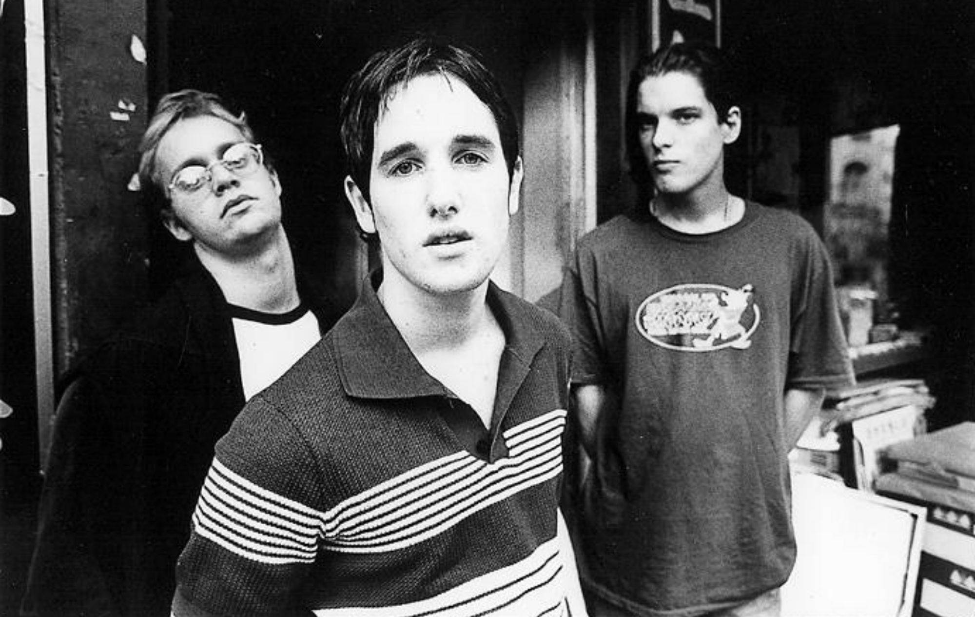 Black and white promotional photo of the three members of Ash taken in 1996.